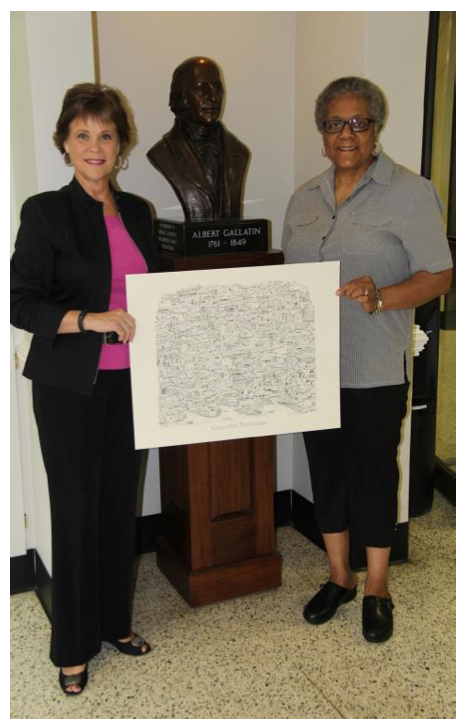 Mayor Jo Ann Graves presents historian and author Velma Brinkley with a “time capsule art” pen & ink drawing of Gallatin. Mrs. Brinkley consulted on the historical aspects of the montage.